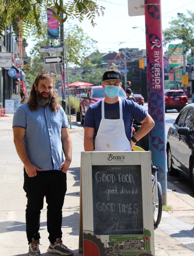 Jamie Zeldin of Hullmark (left) with Ben Denham of White Lily Diner who are part of the CafeTO and Queen East Eats programme in 2021