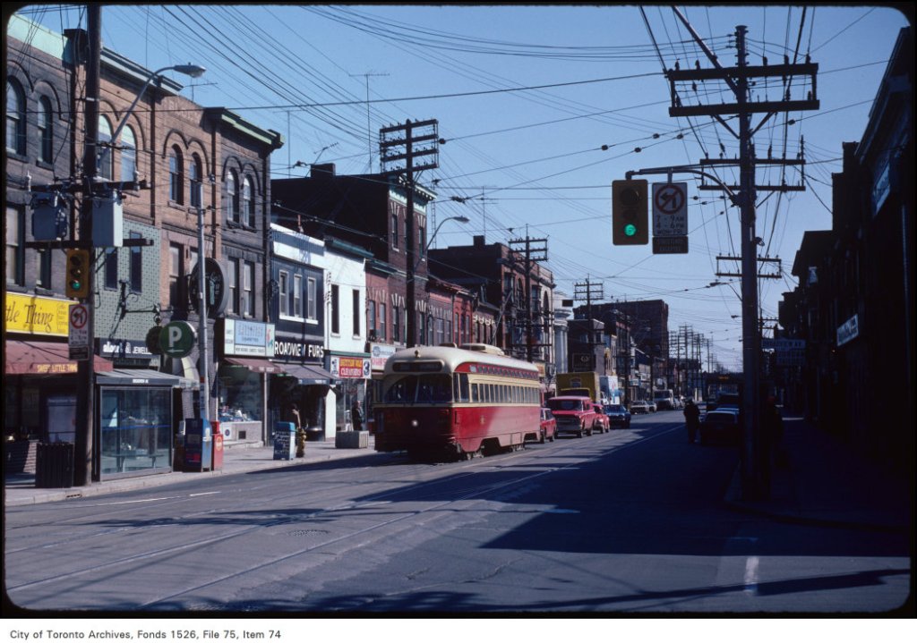 View of Queen Street East, view east across Broadview Avenue, Riverside neighbourhood, Toronto – April 2, 1982