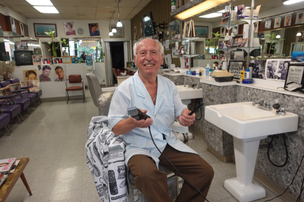 George, owner of Broadview Beauty Parlour in Toronto's Riverside neighbourhood. Photography credit vinita.kalia