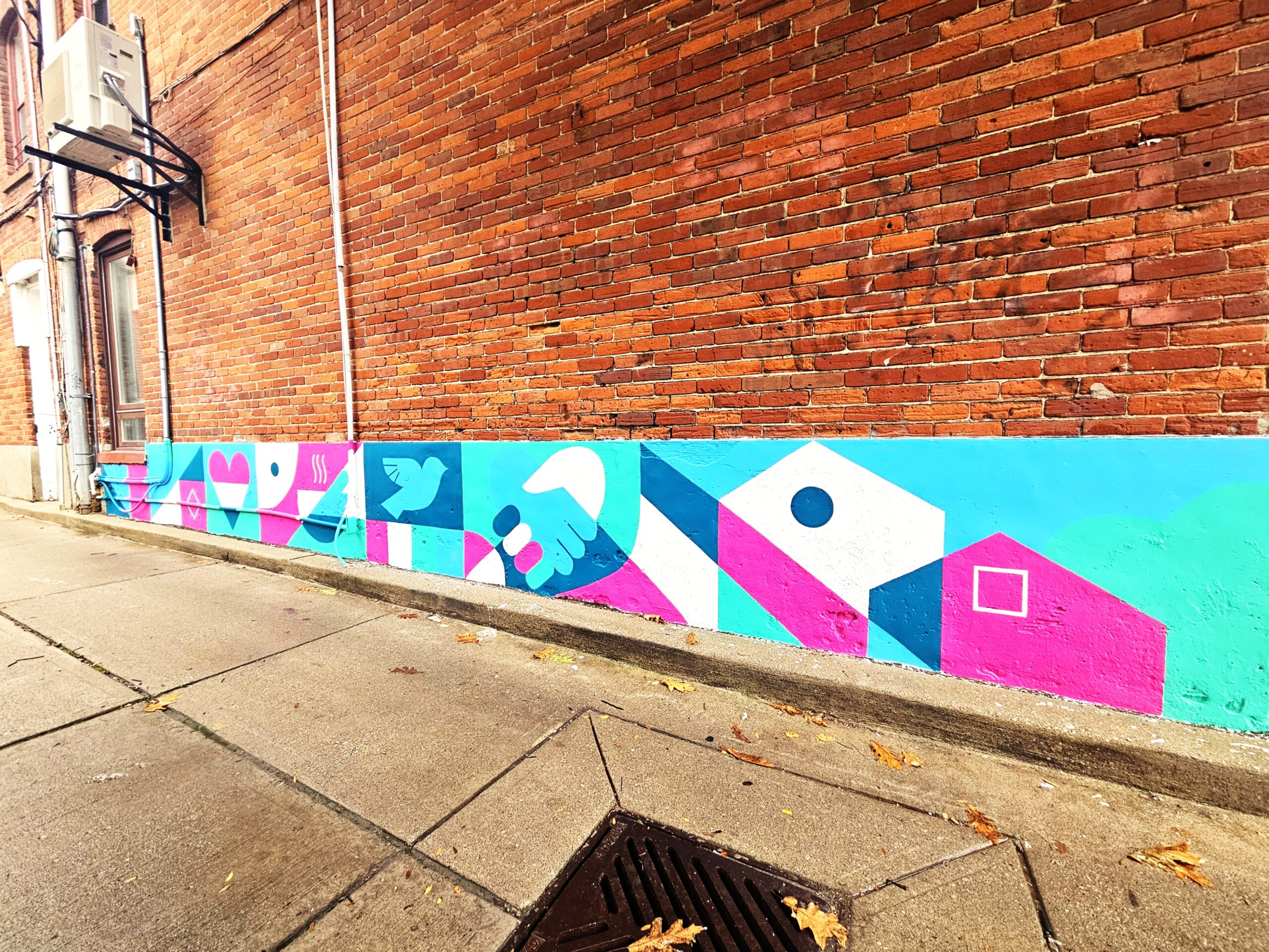 Pass It On Murals at Fontbonne 791 Queen St East by Gust of Wind Studio a project of Riverside BIA