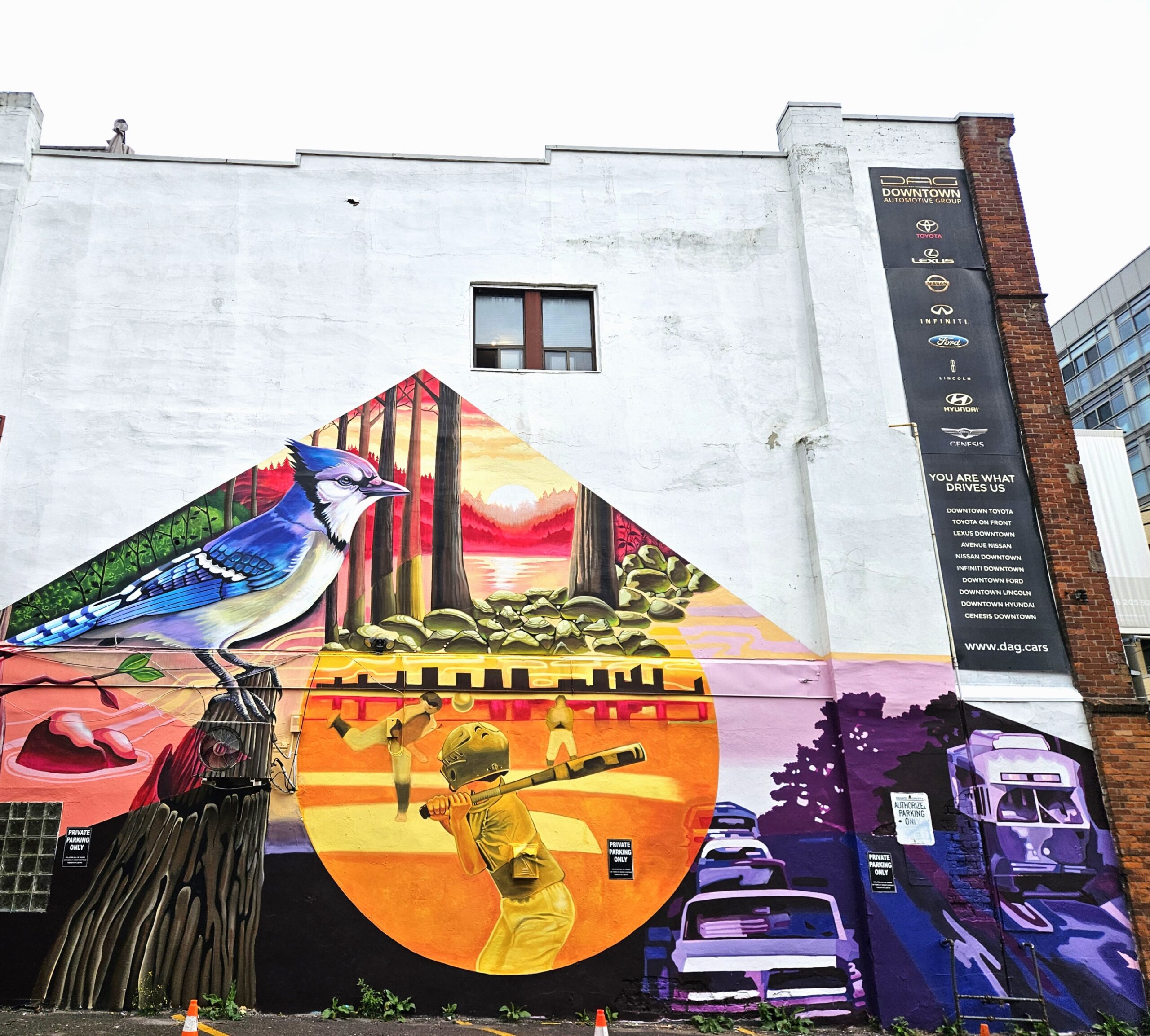 Mural by Cesar Alonso in Riverside Toronto at 643 Queen Street East